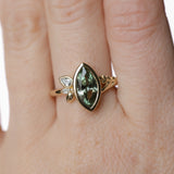 1.82ct Green Untreated Montana Marquise Sapphire in Wandering Vine Low Profile Bezel Setting with Pear Diamond in 14k Yellow Gold