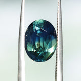 4.53CT OVAL MADAGASCAR SAPPHIRE, PARTI BLUE GREEN YELLOW, UNTREATED, 11.3X8.7X5.7MM