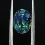 4.53CT OVAL MADAGASCAR SAPPHIRE, PARTI BLUE GREEN YELLOW, UNTREATED, 11.3X8.7X5.7MM