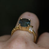 4.20ct Oval Blue Madagascar Sapphire in Wandering Vine Low Profile 4 Prong Setting with Diamonds in 18k Yellow Gold