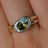 1.52ct Untreated Oval Brilliant Nigerian Parti Sapphire East-West Bezel Solitaire Alluvial Style Ring in 14k Green Gold