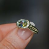 1.52ct Untreated Oval Brilliant Nigerian Parti Sapphire East-West Bezel Solitaire Alluvial Style Ring in 14k Green Gold