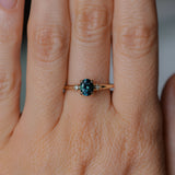 0.85ct Oval Deep Teal Montana Sapphire and Princess Cut Diamond Rapids Low Profile Ring in 14k Yellow Gold