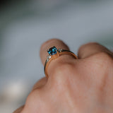 0.85ct Oval Deep Teal Montana Sapphire and Princess Cut Diamond Rapids Low Profile Ring in 14k Yellow Gold
