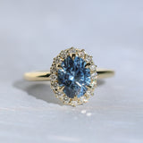 2.52ct Oval Untreated Montana Sapphire Antique-Style Diamond Halo Ring in 18k Yellow Gold