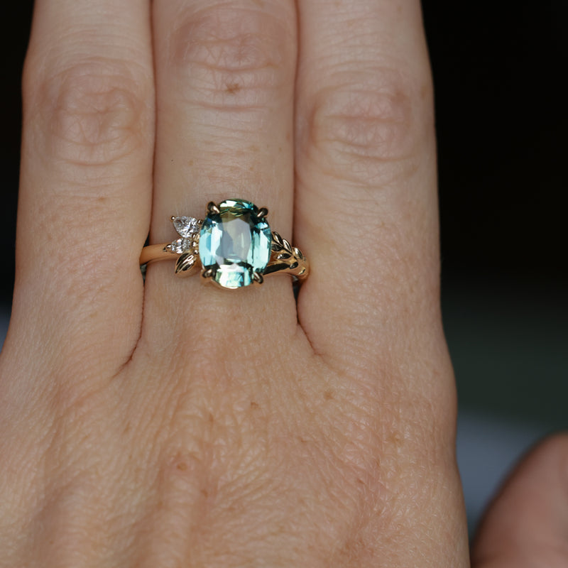 3.07ct Untreated Oval Madagascar Sapphire in Wandering Vine Low Profile 4 Prong Setting with Diamonds in 14k Yellow Gold