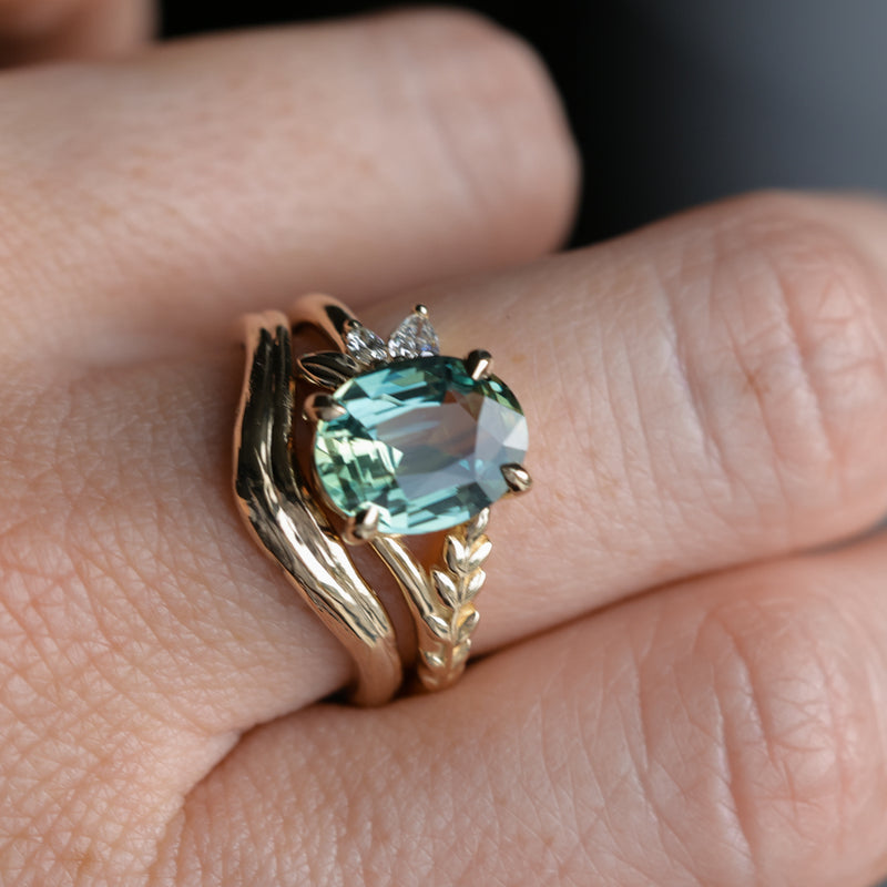 3.07ct Untreated Oval Madagascar Sapphire in Wandering Vine Low Profile 4 Prong Setting with Diamonds in 14k Yellow Gold