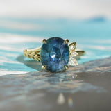 4.20ct Oval Blue Madagascar Sapphire in Wandering Vine Low Profile 4 Prong Setting with Diamonds in 18k Yellow Gold
