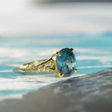 4.20ct Oval Blue Madagascar Sapphire in Wandering Vine Low Profile 4 Prong Setting with Diamonds in 18k Yellow Gold