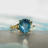 4.20ct Oval Blue Madagascar Sapphire in Wandering Vine Low Profile 4 Prong Setting with Diamonds in 18k Yellow Gold