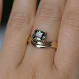 1.65ct Emerald Cut Color Shifting Madagascar Sapphire Prong Set Ripple Contour Solitaire in 14k Yellow Gold