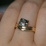 1.65ct Emerald Cut Color Shifting Madagascar Sapphire Prong Set Ripple Contour Solitaire in 14k Yellow Gold