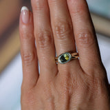 1.52ct Untreated Oval Brilliant Nigerian Parti Sapphire East-West Bezel Solitaire Alluvial Style Ring in 14k Green Gold