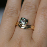 1.65ct Emerald Cut Color Shifting Madagascar Sapphire Prong Set Ripple Contour Solitaire in 14k Yellow Gold