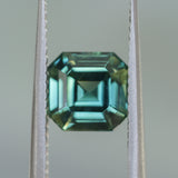 2.16CT MADAGASCAR EMERALD CUT SAPPHIRE, DEEP GREEN WITH SOME YELLOW AND TEAL, 6.9X6.8X4.6MM