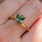 2.16CT MADAGASCAR EMERALD CUT SAPPHIRE, DEEP GREEN WITH SOME YELLOW AND TEAL, 6.9X6.8X4.6MM