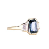 2.02ct Untreated Radiant Cut Color Shifting Sapphire and White Diamond Three Stone Bezel Set Ring in 14k Yellow Gold