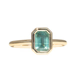 1.26ct Australian Untreated Emerald Cut Caribbean Teal Sapphire Low Profile Bezel Ring in 14k Yellow Gold