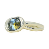 1.52ct Untreated Oval Brilliant Nigerian Parti Sapphire East-West Bezel Solitaire Alluvial Style Ring in 14k Green Gold