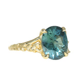 4.20ct Oval Blue Madagascar Sapphire in Wandering Vine Low Profile 4 Prong Setting with Diamonds in 18k Yellow Gold