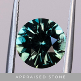 4.23CT FANCY ROUND MADAGASCAR SAPPHIRE, MEDIUM TEAL GREEN BLUE, 10.15X6.24MM - APPRAISED STONE