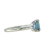 0.95ct Madagascar Emerald Cut and 0.67ctw Montana Sapphire Three Stone Low Profile Ring in 14k Green Gold