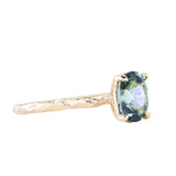 1.74ct Oval Untreated Blue Madagascar Sapphire Four Prong Evergreen Solitaire in 14k Yellow Gold