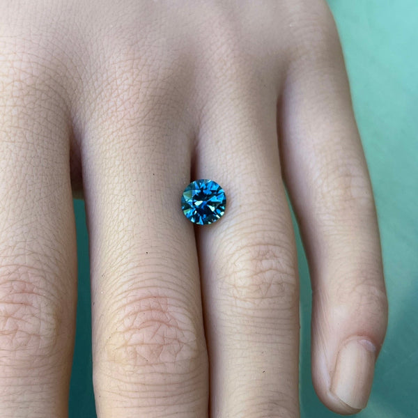 2.03CT PRECISION CUT ROUND BRILLIANT MONTANA SAPPHIRE, TEAL BLUE WITH GREEN, 7.3MM