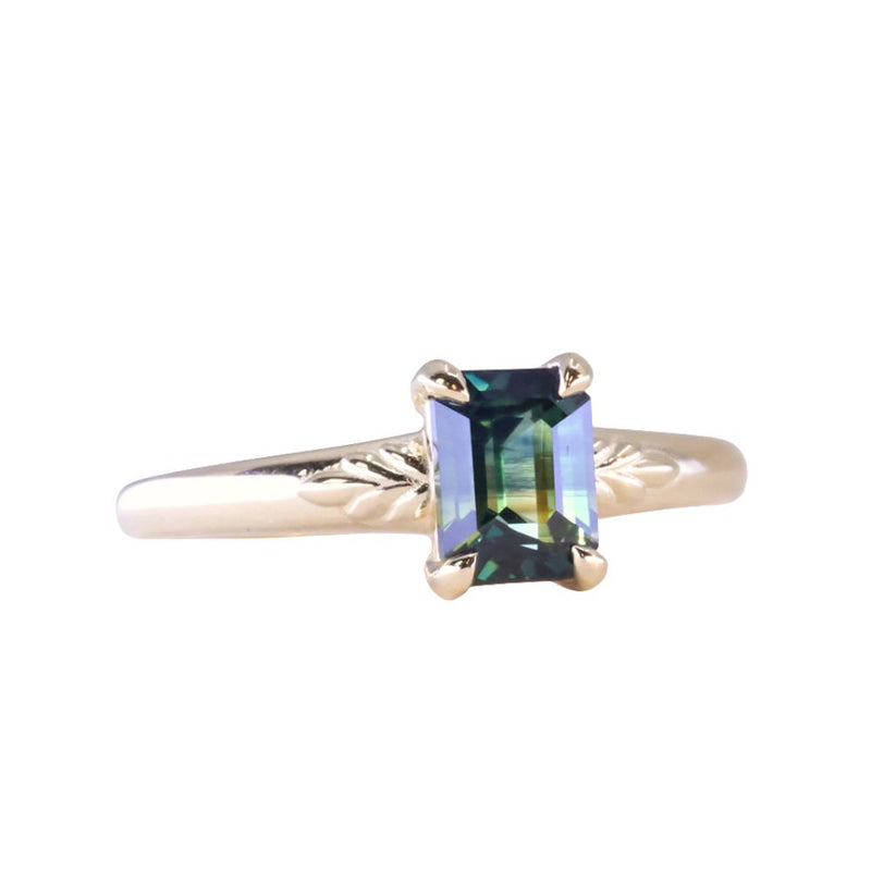 1.53ct Untreated Emerald Cut Parti Sapphire Low Profile Four Prong Spring Bloom Solitaire in 14k Yellow Gold