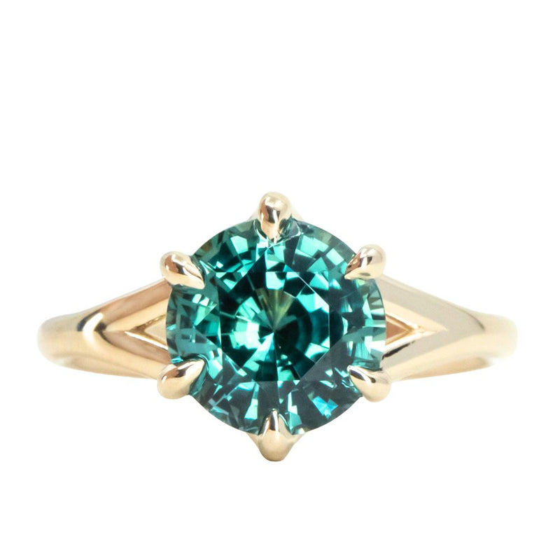 3.76ct Teal Round Sapphire Low Profile Six Prong Split Shank Solitaire in 14k Yellow Gold3.76ct Teal Round Sapphire Low Profile Six Prong Split Shank Solitaire in 14k Yellow Gold