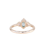 0.73ct Oval Unheated Montana Sapphire and Trillion Diamond Low Profile Ring in 14k Yellow Gold