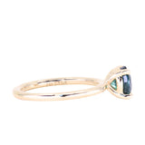 1.51ct Oval Teal Blue Madgascar Sapphire Classic Four Prong Solitaire in 14k Yellow Gold