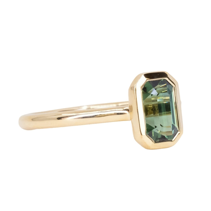 1.61ct Untreated Emerald Cut Green Sapphire Contemporary Bezel Set Ring in 18k Yellow Gold