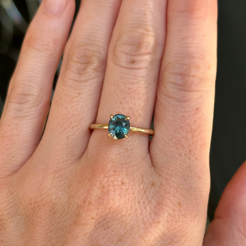 1.51ct Oval Teal Blue Madgascar Sapphire Classic Four Prong Solitaire in 14k Yellow Gold