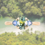 1.68ct Oval Untreated Madagascar Parti Sapphire and Trillion Sapphire Three Stone Low Profile Ring in 14k Yellow Gold