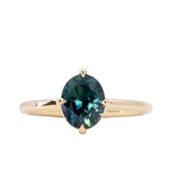 1.65ct Untreated Deep Teal Nigerian Oval Sapphire Four Prong Compass Set Solitaire in 18k Yellow Gold