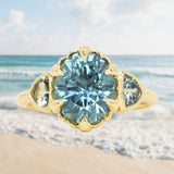 3.93ct Untreated Oval Teal Montana Sapphire and Trillion Australian Sapphire Three Stone Scallop Cup Antique Style with Milgrain Low Profile Ring in 18k Yellow Gold