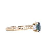 1.36ct Oval Montana Sapphire and Lab Diamond Three Stone Ring in 14K Yellow Gold with Evergreen Texture