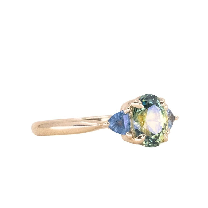 1.68ct Oval Untreated Madagascar Parti Sapphire and Trillion Sapphire Three Stone Low Profile Ring in 14k Yellow Gold