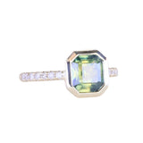 2.18ct Emerald Cut Parti Madagascar Sapphire Low Profile Bezel Solitaire Ring with Pavé Set Diamonds in 14k Green Gold