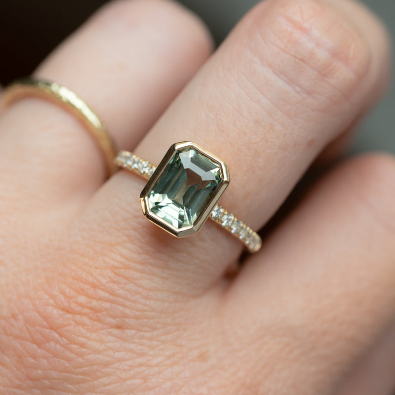 3.02ct Emerald Cut Madagascar Minty Sapphire Low Profile Bezel Solitaire Ring with French Set Diamonds in 14k Yellow Gold