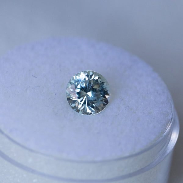 1.44CT ROUND PRECISION CUT MONTANA SAPPHIRE, WHITE BRILLIANT, 6.56X4.50MM