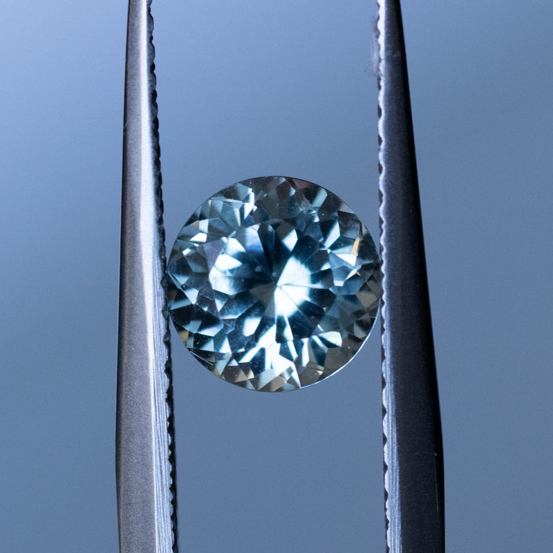 1.44CT ROUND PRECISION CUT MONTANA SAPPHIRE, WHITE BRILLIANT, 6.56X4.50MM