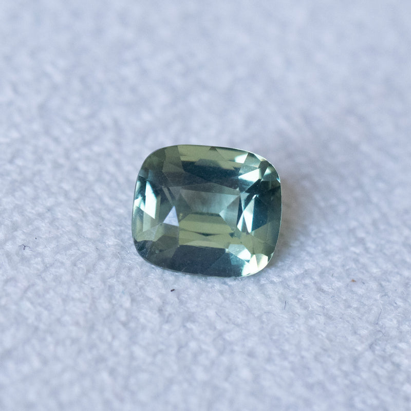 1.60CT CUSHION MADAGASCAR SAPPHIRE, LIGHT SAGE GREEN WITH YELLOW AND BLUE, 7.29X6.39X3.84MM