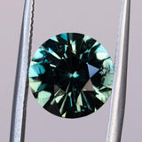 4.23CT FANCY ROUND MADAGASCAR SAPPHIRE, MEDIUM TEAL GREEN BLUE, 9.5X5.8MM