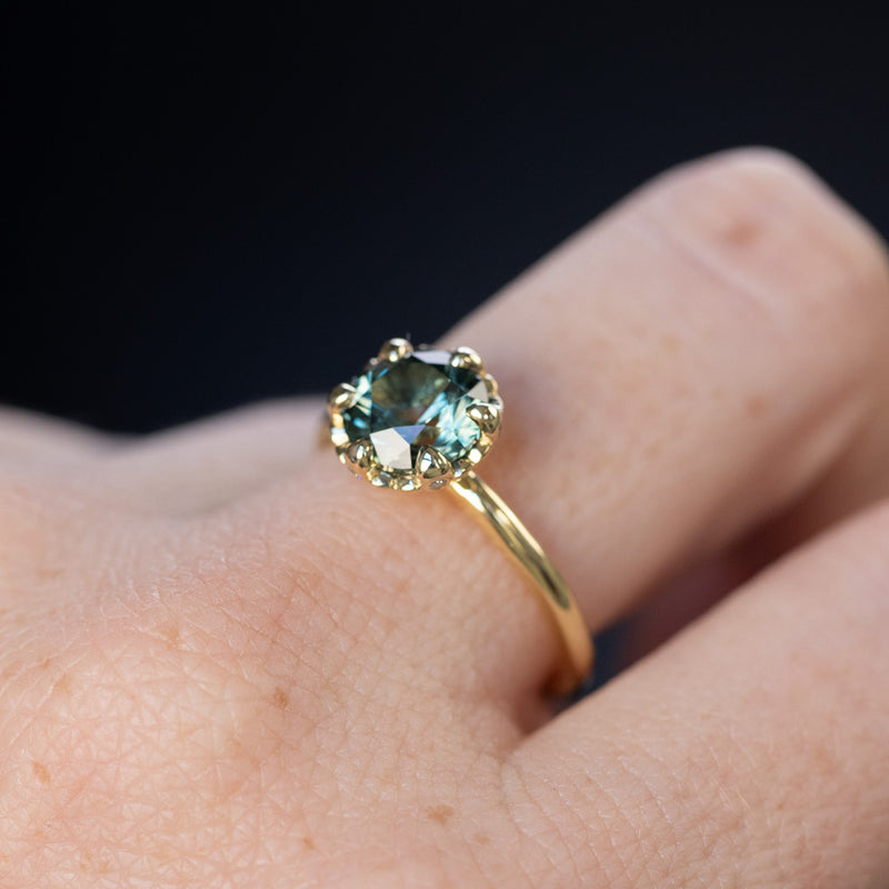 2.25ct Precision Cut Round Teal Green Montana Sapphire Scallop Cup Solitaire in 18k Yellow gold with hidden Diamonds