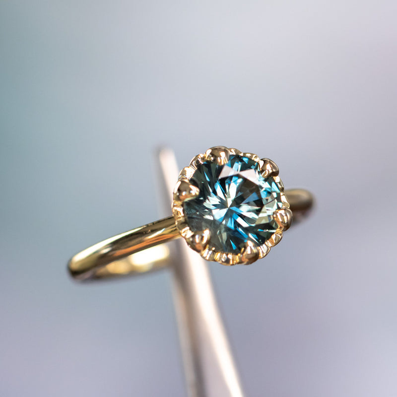 2.25ct Precision Cut Round Teal Green Montana Sapphire Scallop Cup Solitaire in 18k Yellow gold with hidden Diamonds