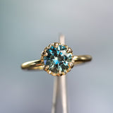 2.25ct Precision Cut Round Teal Green Montana Sapphire Scallop Cup Solitaire in 18k Yellow gold with hidden Diamonds