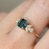 2.03ct Silky Medium Teal Radiant Cut Sapphire and Marquise Diamond Cluster Ring in 14k Yellow Gold
