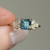 2.03ct Silky Medium Teal Radiant Cut Sapphire and Marquise Diamond Cluster Ring in 14k Yellow Gold